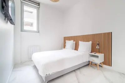 Un ou plusieurs lits dans un hébergement de l'établissement Cosy flat for 6 people #2