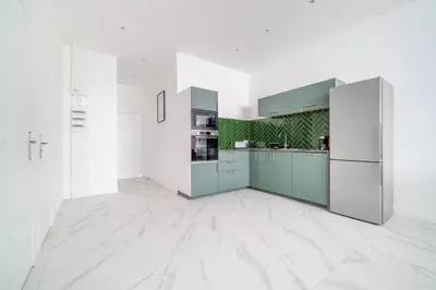 Cuisine ou kitchenette dans l'établissement Cosy flat for 6 people #2
