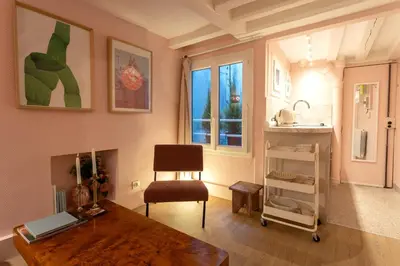 Un ou plusieurs lits dans un hébergement de l'établissement Charmant duplex historique Cœur Marais