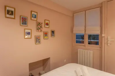 Un ou plusieurs lits dans un hébergement de l'établissement Charmant duplex historique Cœur Marais