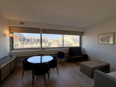 Coin salon dans l'établissement Cosy apartment in Paris 16 near Trocadéro