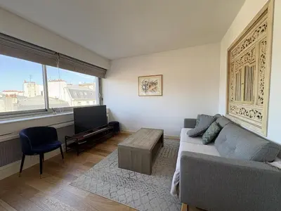 Coin salon dans l'établissement Cosy apartment in Paris 16 near Trocadéro