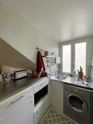 Cuisine ou kitchenette dans l'établissement Charmant appartement parisien