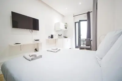 Un ou plusieurs lits dans un hébergement de l'établissement LOVELY PARISIAN APARTMENT