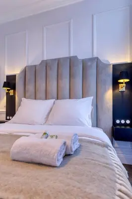 Un ou plusieurs lits dans un hébergement de l'établissement NEW Luxury Flat - Central Area