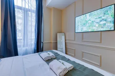 Un ou plusieurs lits dans un hébergement de l'établissement NEW Luxury Flat - Central Area