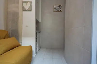 Coin salon dans l'établissement Stay in the Heart of Paris