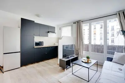 Télévision ou salle de divertissement dans l'établissement Appartement refait à neuf - Paris