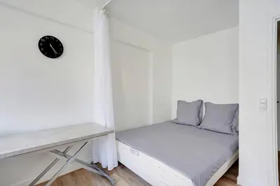 Un ou plusieurs lits dans un hébergement de l'établissement Appartement refait à neuf - Paris