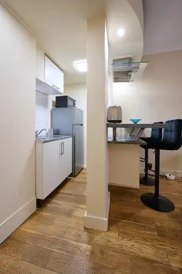 Cuisine ou kitchenette dans l'établissement Le Refuge Parisien