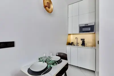 Cuisine ou kitchenette dans l'établissement Apartment Bastille Le Marais by Studio prestige