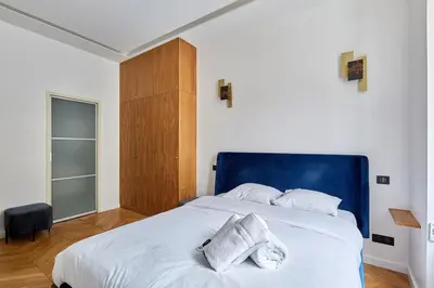 Un ou plusieurs lits dans un hébergement de l'établissement Apartment Bastille Le Marais by Studio prestige