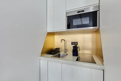 Cuisine ou kitchenette dans l'établissement Apartment Bastille Le Marais by Studio prestige