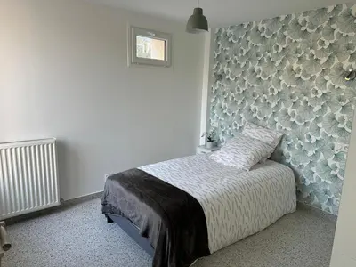 Un ou plusieurs lits dans un hébergement de l'établissement Dream House Paris 5 chambres proche M7et M14