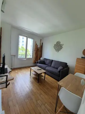 Coin salon dans l'établissement Chambre privée dans magnifique appartement calme