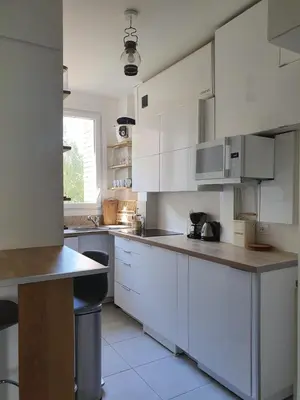 Cuisine ou kitchenette dans l'établissement Chambre privée dans magnifique appartement calme