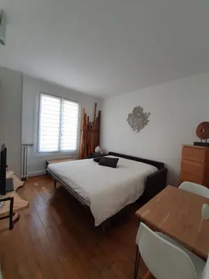 Un ou plusieurs lits dans un hébergement de l'établissement Chambre privée dans magnifique appartement calme