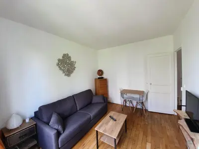 Coin salon dans l'établissement Chambre privée dans magnifique appartement calme