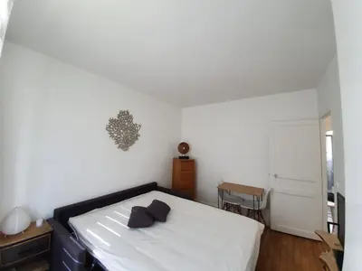 Un ou plusieurs lits dans un hébergement de l'établissement Chambre privée dans magnifique appartement calme