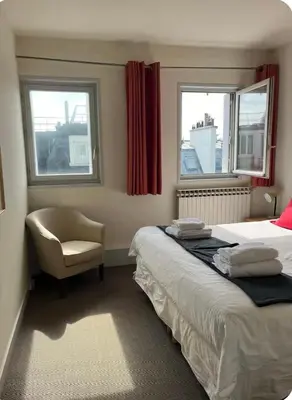 Un ou plusieurs lits dans un hébergement de l'établissement 2 bedrooms in the sky !