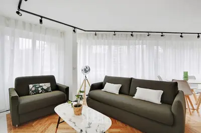 Coin salon dans l'établissement Appartement Cosy pour 4 à La Villette - Paris