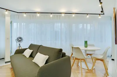 Coin salon dans l'établissement Appartement Cosy pour 4 à La Villette - Paris