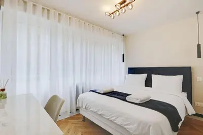 Un ou plusieurs lits dans un hébergement de l'établissement Appartement Cosy pour 4 à La Villette - Paris
