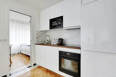 Cuisine ou kitchenette dans l'établissement Appartement Cosy pour 4 à La Villette - Paris