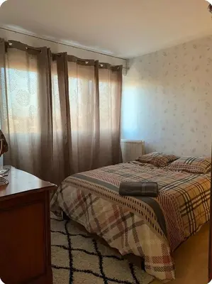 Un ou plusieurs lits dans un hébergement de l'établissement Chambre#1privée en colocation Vue sur Paris Tour Eiffel