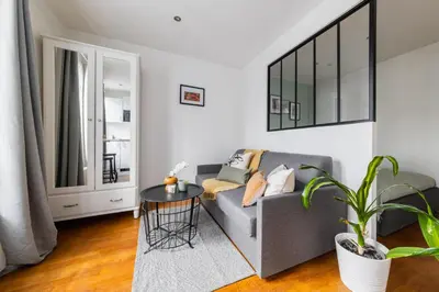 Coin salon dans l'établissement Cosy Apt Batignoles
