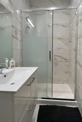 Salle de bains dans l'établissement Superbe appartement proche Paris