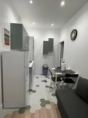 Cuisine ou kitchenette dans l'établissement Superbe appartement proche Paris