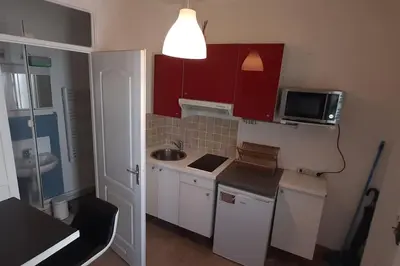 Cuisine ou kitchenette dans l'établissement Calme, proche de Paris/ parc des princes