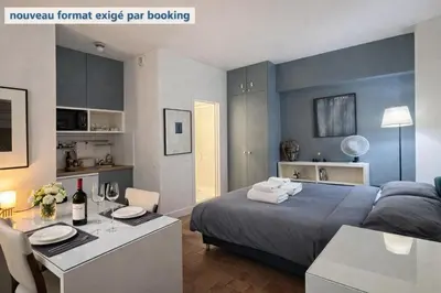 Un ou plusieurs lits dans un hébergement de l'établissement Très Joli studio en plein cœur du 11eme