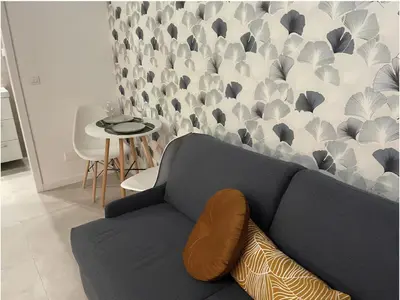 Coin salon dans l'établissement Modern Studio Apt In The Heart Of Paris