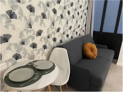Coin salon dans l'établissement Modern Studio Apt In The Heart Of Paris