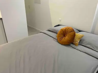 Un ou plusieurs lits dans un hébergement de l'établissement Cozy Studio In The Heart Of Paris