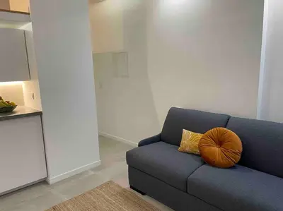 Coin salon dans l'établissement Cozy Studio In The Heart Of Paris