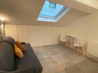 Coin salon dans l'établissement Charming Studio In The Heart Of Paris