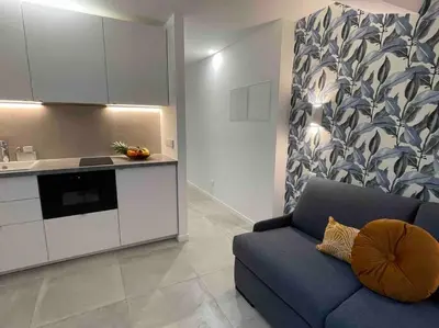 Cuisine ou kitchenette dans l'établissement Charming Studio In The Heart Of Paris
