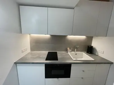 Cuisine ou kitchenette dans l'établissement Bright studio apartment in the heart of Paris