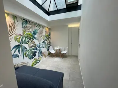 Coin salon dans l'établissement Bright studio apartment in the heart of Paris