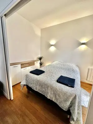 Un ou plusieurs lits dans un hébergement de l'établissement Appartement 50m2 avec terrasse idéalement situé