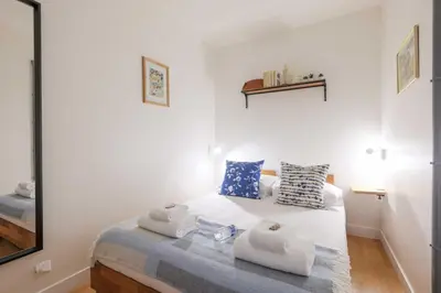 Un ou plusieurs lits dans un hébergement de l'établissement Spacious apartment - 2BR-6P - Bastille