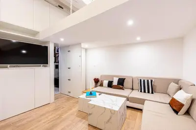 Coin salon dans l'établissement GuestReady: Designer Studio in the heart of Marais