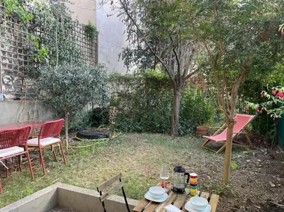 Jardin de l'établissement Charmant T2 avec Jardin