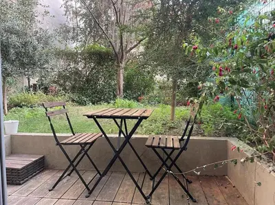 Jardin de l'établissement Charmant T2 avec Jardin