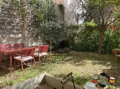 Jardin de l'établissement Charmant T2 avec Jardin