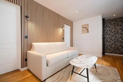 Coin salon dans l'établissement Lovely apartment Near Canal St Martin