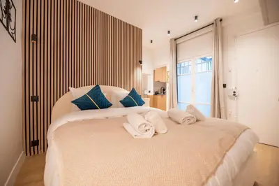 Un ou plusieurs lits dans un hébergement de l'établissement Cosy flat / Tour Eiffel Area